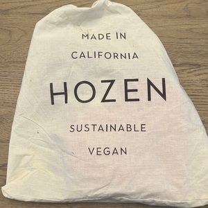 Hozen heart shaped handbag. Italian vegan grain based Leather. Brand new.